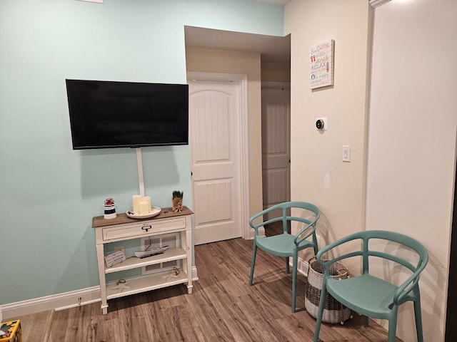 living area featuring hardwood / wood-style flooring