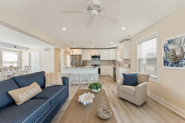 120 W 1st Ave Unit 1, North Wildwood, NJ 08260 - living room with light wood-style flooring, ceiling fan, and recessed lighting