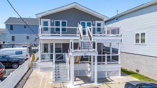 120 W 1st Ave Unit 1, North Wildwood, NJ 08260 - back of house with stairs and a porch