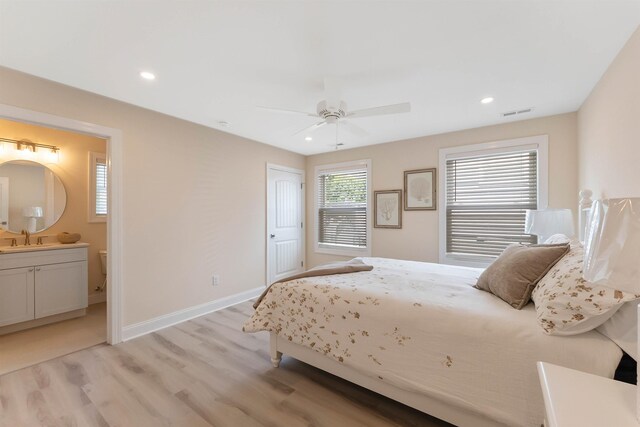120 W 1st Ave Unit 1, North Wildwood, NJ 08260 - bedroom featuring light wood-type flooring, ensuite bathroom, recessed lighting, and a ceiling fan