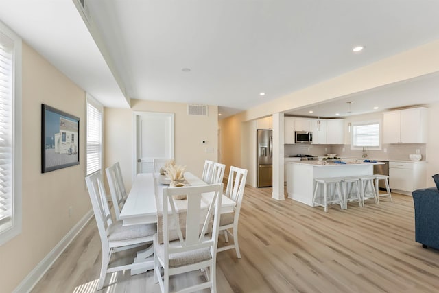 120 W 1st Ave Unit 1, North Wildwood, NJ 08260 - dining area featuring light wood finished floors and recessed lighting