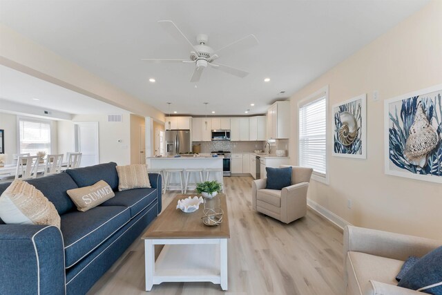 120 W 1st Ave Unit 1, North Wildwood, NJ 08260 - living area with ceiling fan, light wood-type flooring, and recessed lighting