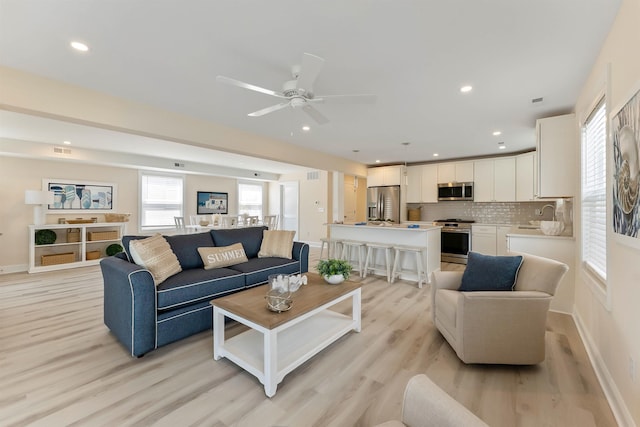 120 W 1st Ave Unit 1, North Wildwood, NJ 08260 - living area featuring light wood-type flooring, ceiling fan, and recessed lighting