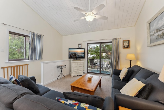 living room with ceiling fan, a healthy amount of sunlight, wood ceiling, and light carpet