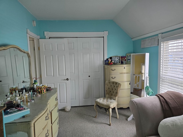 sitting room with light carpet and lofted ceiling