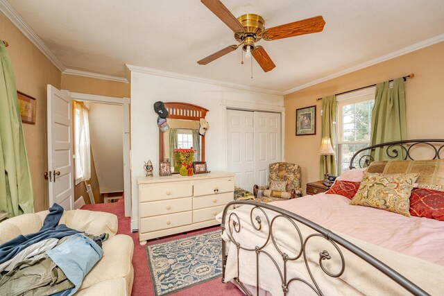 bedroom featuring carpet, a closet, crown molding, and ceiling fan