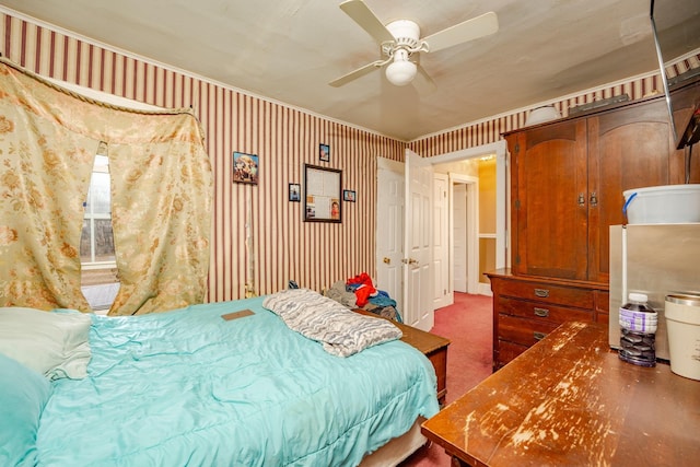 carpeted bedroom featuring ceiling fan and wallpapered walls