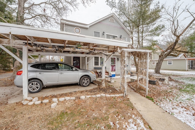 view of front of property with a carport