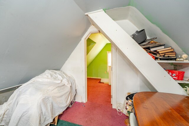 interior space featuring vaulted ceiling