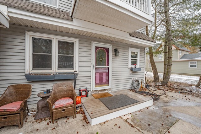 doorway to property with a patio