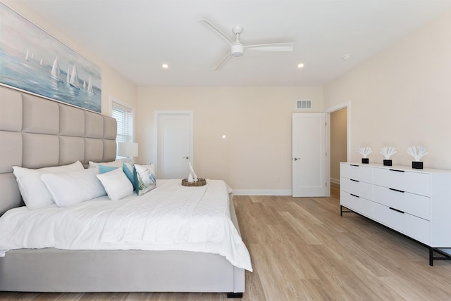 bedroom featuring light hardwood / wood-style floors and ceiling fan