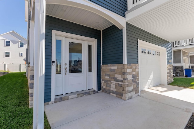 property entrance with a garage