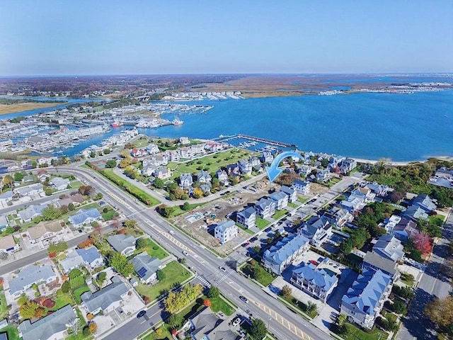 drone / aerial view featuring a water view