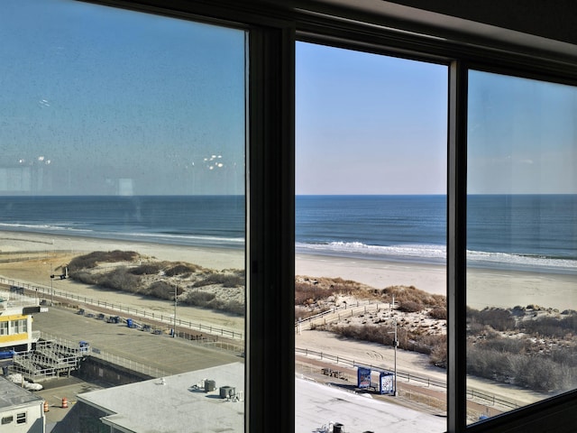 property view of water featuring a beach view