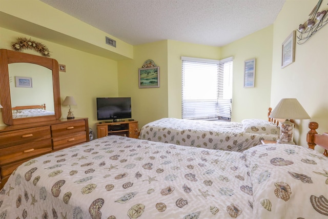 bedroom with a textured ceiling