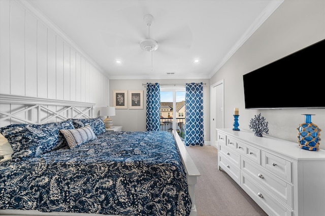 bedroom with ceiling fan, crown molding, and light carpet