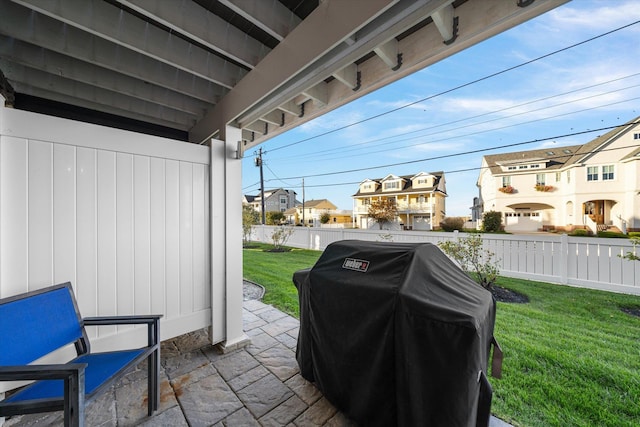 view of patio with a grill