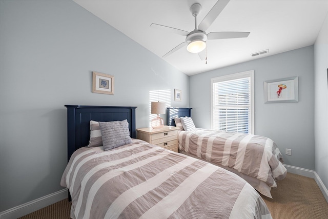 bedroom featuring ceiling fan and carpet floors