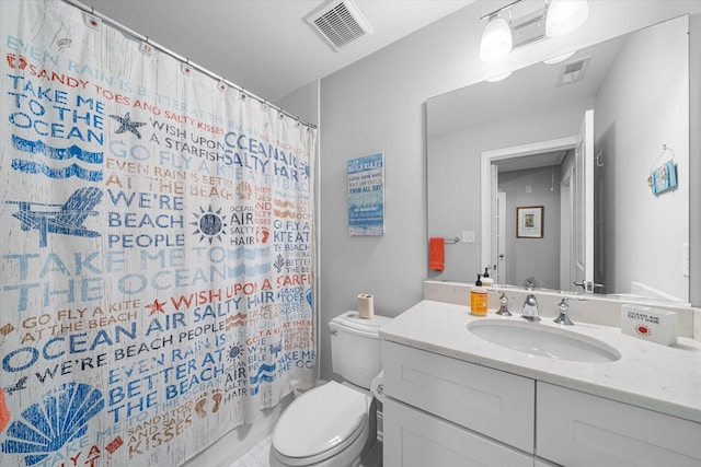 full bathroom featuring vanity, shower / tub combo, and toilet