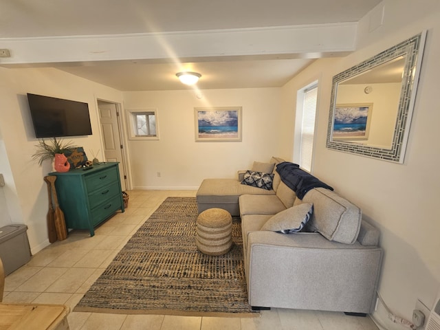 tiled living room with beamed ceiling