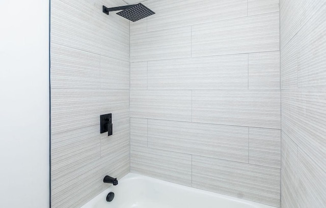 bathroom with shower / tub combination