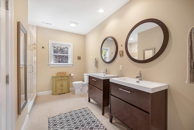 735 Maple Ave, West Cape May, NJ 08204 - full bathroom featuring a shower stall, two vanities, and tile patterned flooring