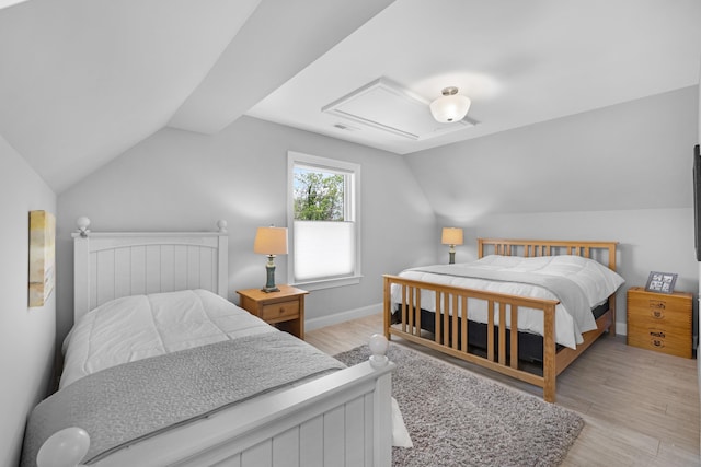 735 Maple Ave, West Cape May, NJ 08204 - bedroom with wood finished floors and vaulted ceiling