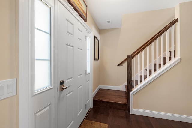 735 Maple Ave, West Cape May, NJ 08204 - entrance foyer featuring dark wood-style flooring and stairs