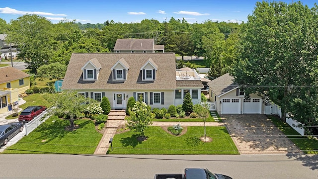 735 Maple Ave, West Cape May, NJ 08204 - cape cod home with a garage, driveway, and roof with shingles