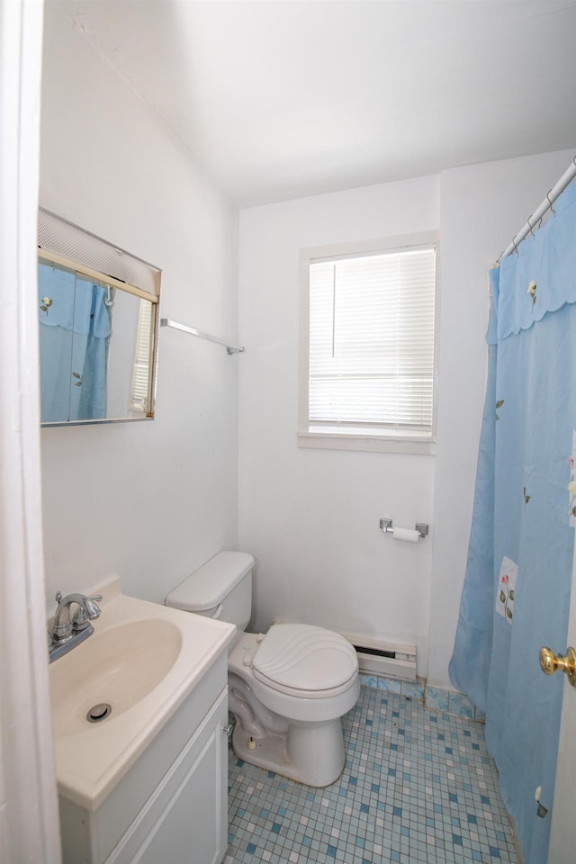 bathroom with vanity, a shower with curtain, toilet, tile patterned floors, and a baseboard radiator