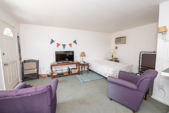 carpeted bedroom with a wall mounted air conditioner