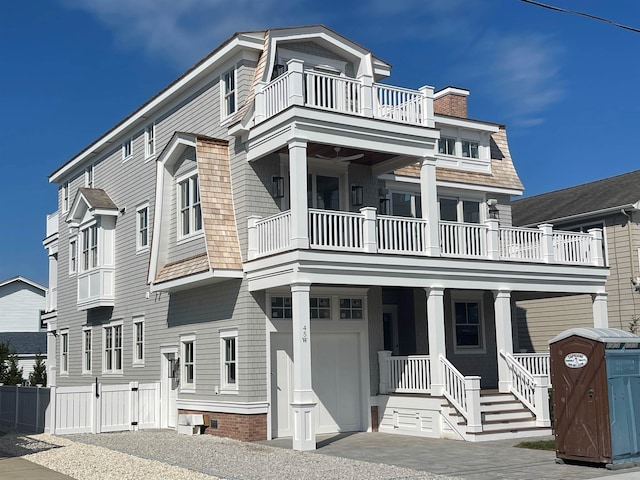 view of front of house with a balcony