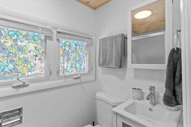 6 E Atlantic Ave, Villas, NJ 08251 - bathroom featuring a sink, toilet, and a shower with door