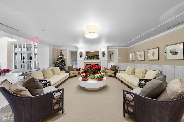 living room featuring crown molding