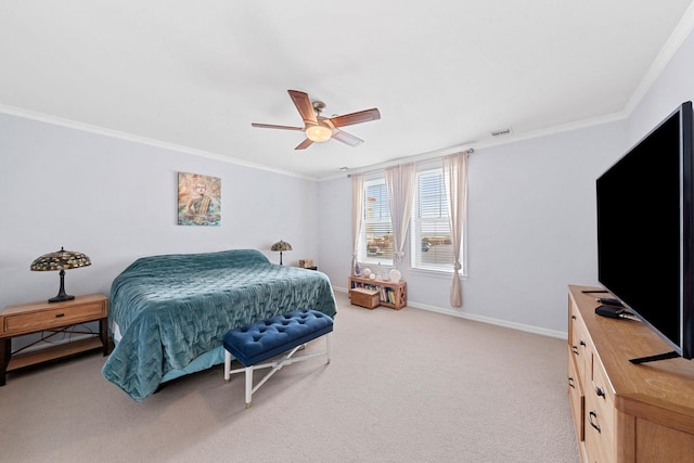 bedroom with carpet, ceiling fan, and ornamental molding