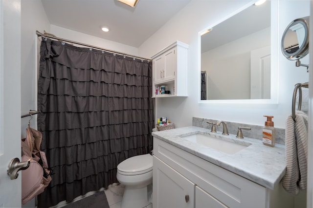 bathroom with marble finish floor, recessed lighting, toilet, vanity, and a shower with curtain