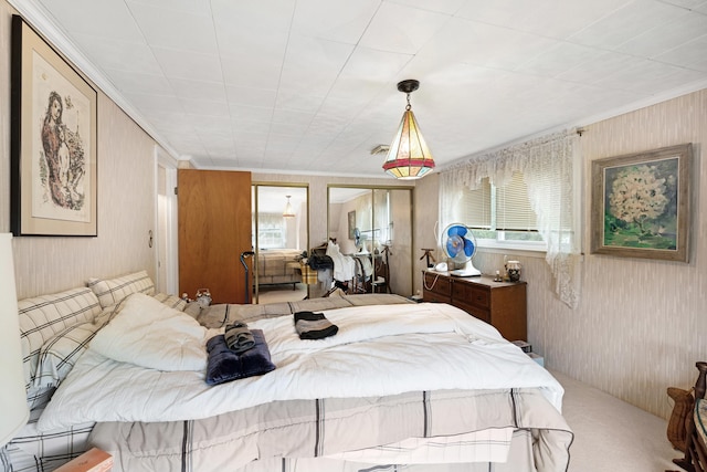 100 Oakdale Ave, Villas, NJ 08251 - bedroom with multiple windows, carpet flooring, wood walls, and ornamental molding