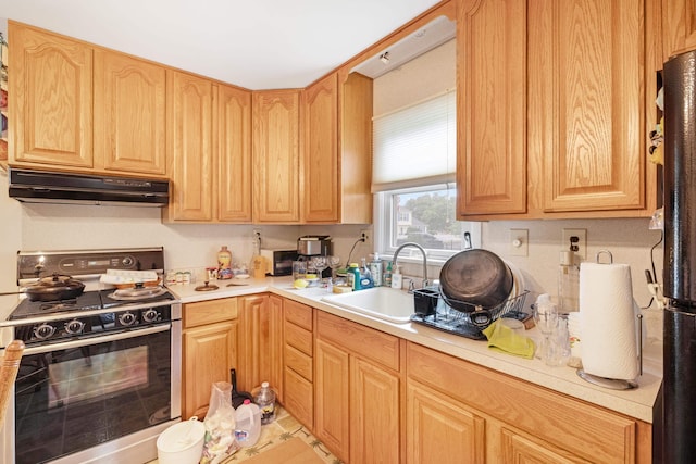 100 Oakdale Ave, Villas, NJ 08251 - kitchen featuring gas stove, range hood, light countertops, and light brown cabinets