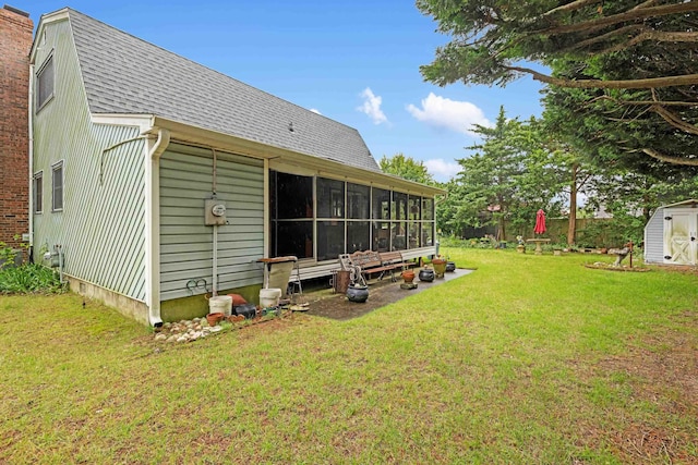100 Oakdale Ave, Villas, NJ 08251 - view of green lawn featuring a sunroom and a shed
