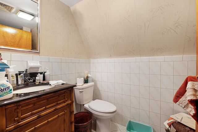 100 Oakdale Ave, Villas, NJ 08251 - bathroom with tile walls, vanity, a wainscoted wall, and wallpapered walls