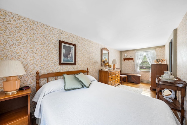 2320 Shore Rd, Ocean View, NJ 08210 - bedroom with wallpapered walls and wood finished floors