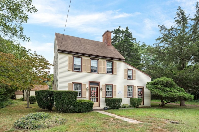 2320 Shore Rd, Ocean View, NJ 08210 - colonial house featuring a chimney, a front yard, and a shingled roof