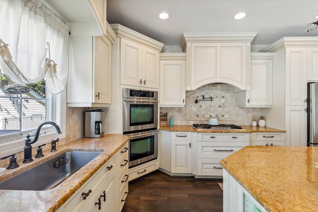 148 W Heather Rd Unit 148, Wildwood Crest, NJ 08260 - kitchen with stainless steel appliances, a sink, dark wood-type flooring, light stone countertops, and recessed lighting
