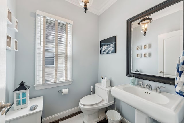 148 W Heather Rd Unit 148, Wildwood Crest, NJ 08260 - bathroom with toilet, crown molding, baseboards, and a sink