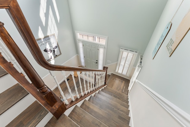 148 W Heather Rd Unit 148, Wildwood Crest, NJ 08260 - stairway with a towering ceiling and wood finished floors