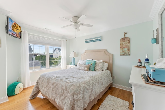 148 W Heather Rd Unit 148, Wildwood Crest, NJ 08260 - bedroom featuring wood finished floors, baseboards, ceiling fan, and ornamental molding