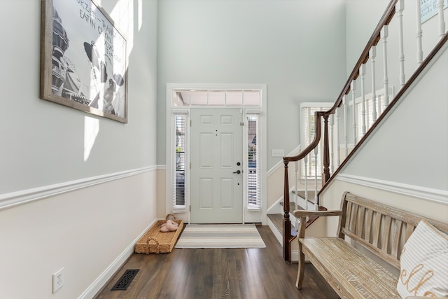 148 W Heather Rd Unit 148, Wildwood Crest, NJ 08260 - entryway featuring a towering ceiling, stairway, wood finished floors, and baseboards