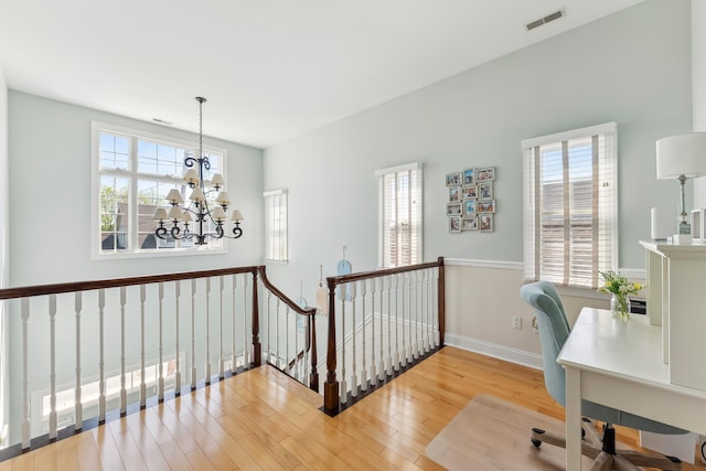 148 W Heather Rd Unit 148, Wildwood Crest, NJ 08260 - office with a chandelier, wood finished floors, and baseboards