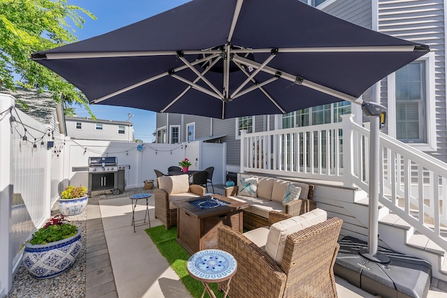 148 W Heather Rd Unit 148, Wildwood Crest, NJ 08260 - view of patio with area for grilling and an outdoor living space with a fire pit