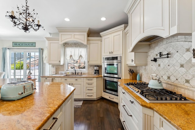 148 W Heather Rd Unit 148, Wildwood Crest, NJ 08260 - kitchen with appliances with stainless steel finishes, a sink, tasteful backsplash, dark wood-style floors, and recessed lighting